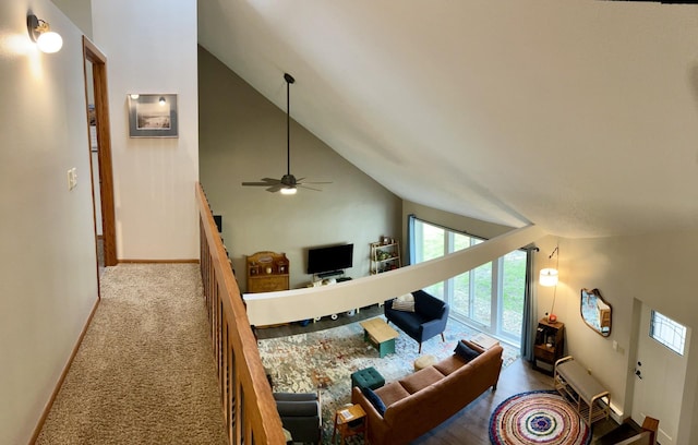 252 Miller St, Spicer, MN 56288 - carpeted living room with plenty of natural light, baseboards, high vaulted ceiling, and a ceiling fan