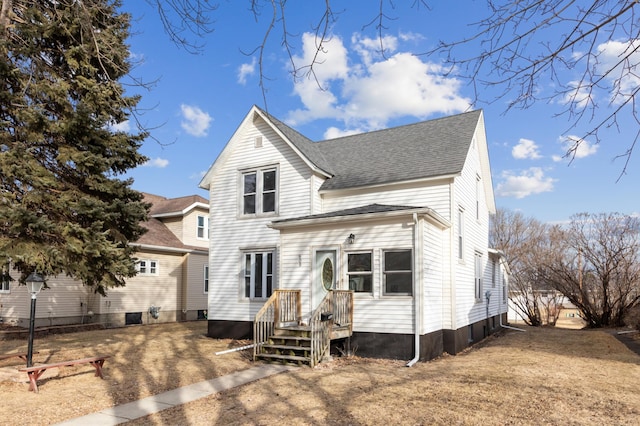 609 2nd Ave NE, Sleepy Eye, MN 56085 - rear view of property with roof with shingles