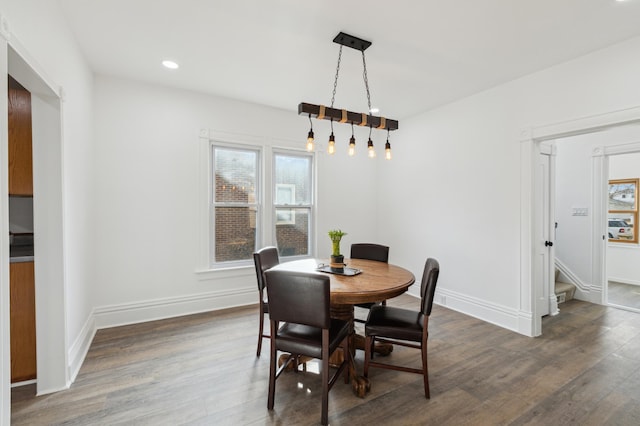 609 2nd Ave NE, Sleepy Eye, MN 56085 - dining area featuring wood finished floors, baseboards, and recessed lighting