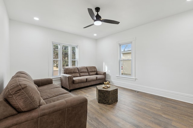 609 2nd Ave NE, Sleepy Eye, MN 56085 - living area featuring wood finished floors, baseboards, a ceiling fan, and recessed lighting