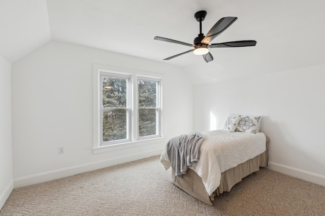 609 2nd Ave NE, Sleepy Eye, MN 56085 - bedroom with vaulted ceiling, baseboards, light carpet, and a ceiling fan