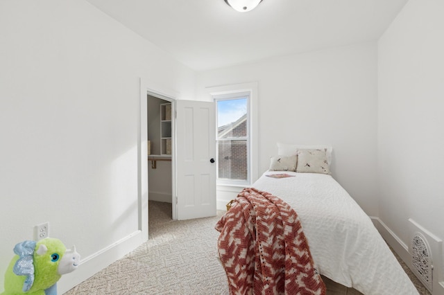 609 2nd Ave NE, Sleepy Eye, MN 56085 - bedroom with carpet and baseboards