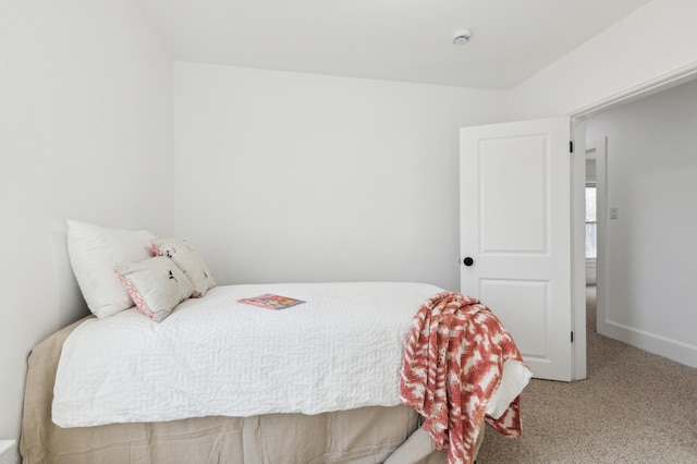 609 2nd Ave NE, Sleepy Eye, MN 56085 - carpeted bedroom featuring baseboards