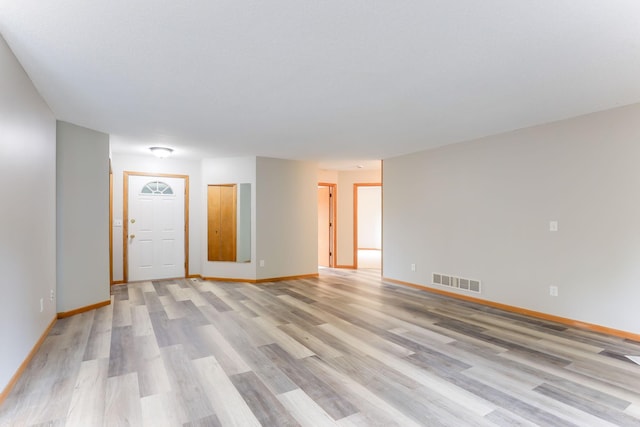 11622 Rio Loma Ln, Burnsville, MN 55337 - empty room with light wood finished floors and baseboards