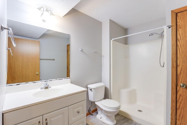 11622 Rio Loma Ln, Burnsville, MN 55337 - full bath with vanity, a shower, toilet, and wood finished floors