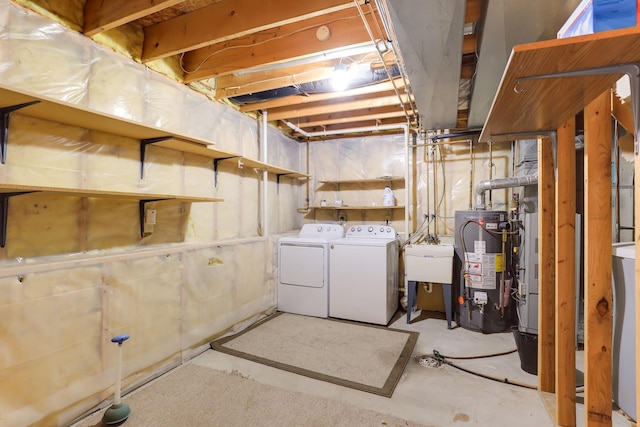 11622 Rio Loma Ln, Burnsville, MN 55337 - unfinished below grade area featuring washer and clothes dryer, water heater, and a sink