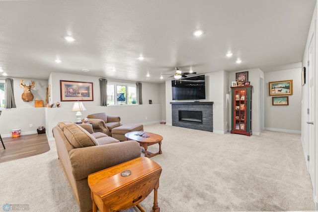 3784 Bell Blvd E, West Fargo, ND 58078 - living area featuring a ceiling fan, a fireplace, light colored carpet, recessed lighting, and baseboards