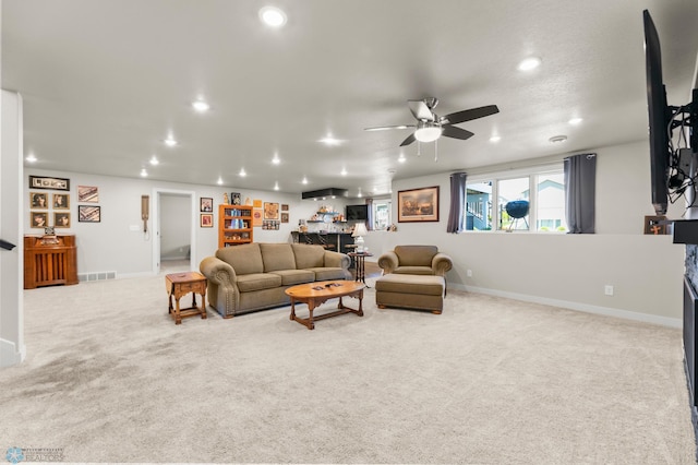 3784 Bell Blvd E, West Fargo, ND 58078 - living area featuring recessed lighting, ceiling fan, light colored carpet, baseboards, and bar