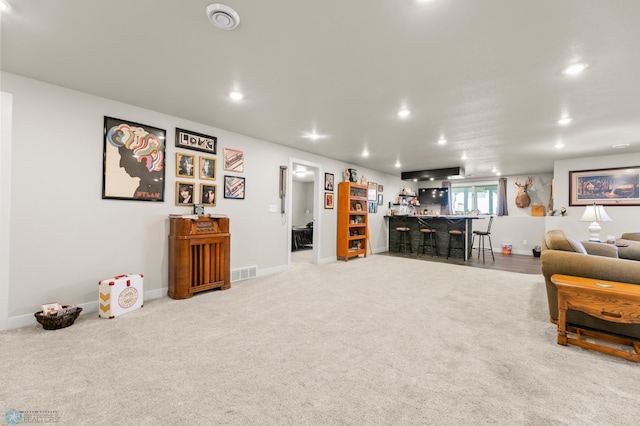 3784 Bell Blvd E, West Fargo, ND 58078 - living area with bar, recessed lighting, carpet, and baseboards