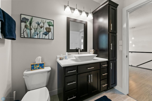 3784 Bell Blvd E, West Fargo, ND 58078 - bathroom featuring vanity, toilet, baseboards, and tile patterned flooring