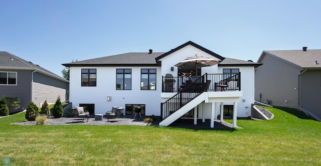 3784 Bell Blvd E, West Fargo, ND 58078 - rear view of house with stairs, a patio, a lawn, and a shingled roof