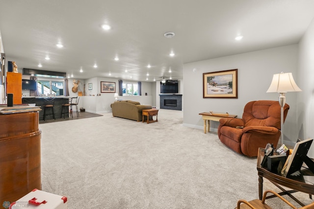 3784 Bell Blvd E, West Fargo, ND 58078 - living room with recessed lighting, baseboards, carpet, and a fireplace