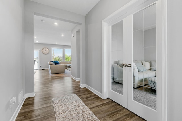 12905 Jewell Cir NE, Blaine, MN 55449 - corridor with french doors, dark wood-style flooring, baseboards, and recessed lighting