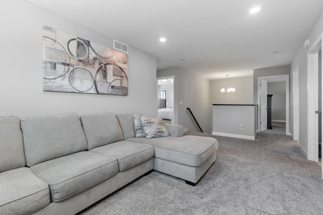 12905 Jewell Cir NE, Blaine, MN 55449 - living area with carpet floors, baseboards, a chandelier, and recessed lighting