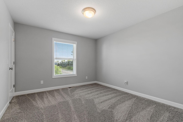 12905 Jewell Cir NE, Blaine, MN 55449 - unfurnished room with carpet floors and baseboards