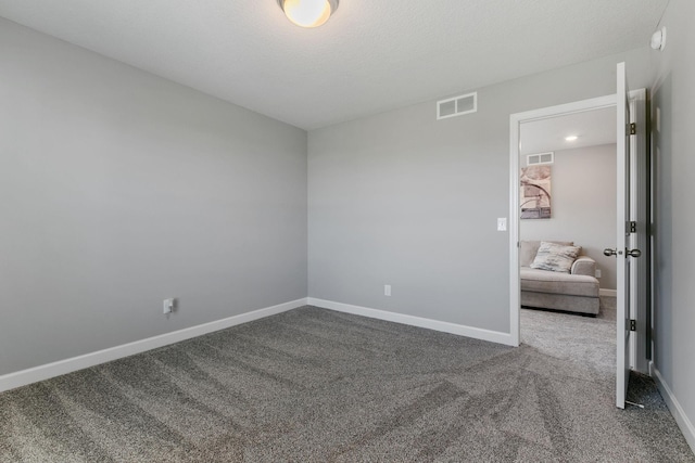 12905 Jewell Cir NE, Blaine, MN 55449 - unfurnished room featuring carpet and baseboards
