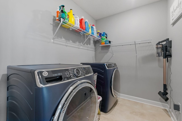 12905 Jewell Cir NE, Blaine, MN 55449 - washroom featuring washing machine and dryer and baseboards