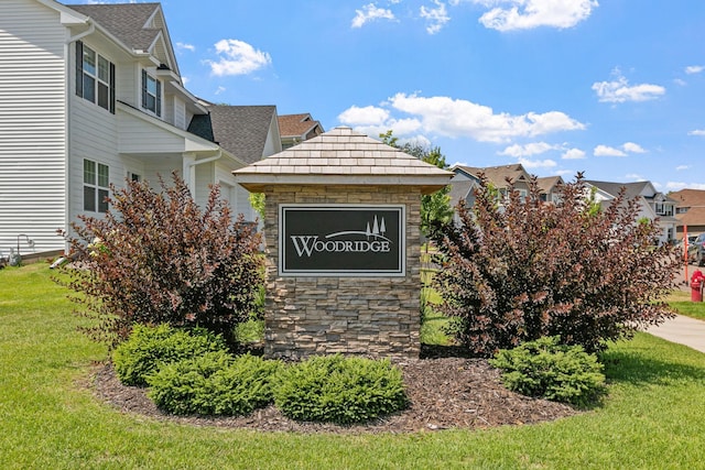 12905 Jewell Cir NE, Blaine, MN 55449 - community sign with a yard and a residential view