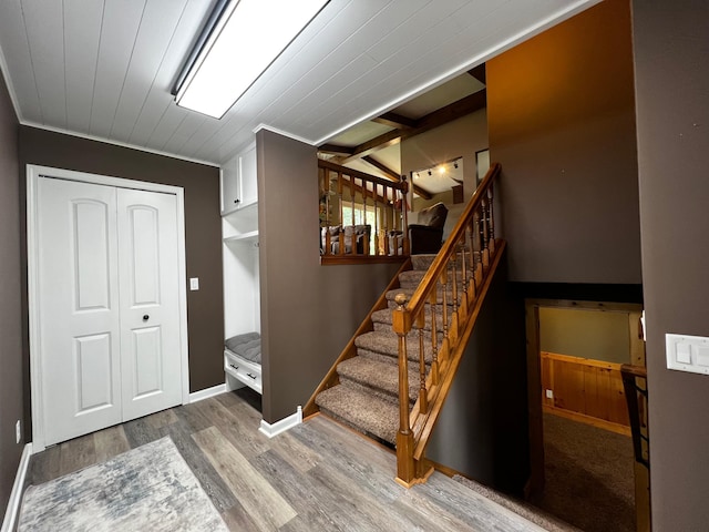 17300 Baseline Ave, Sand Creek Twp, MN 55352 - entrance foyer with wood finished floors, stairs, lofted ceiling, wooden ceiling, and baseboards