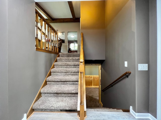 17300 Baseline Ave, Sand Creek Twp, MN 55352 - stairs with beam ceiling and baseboards