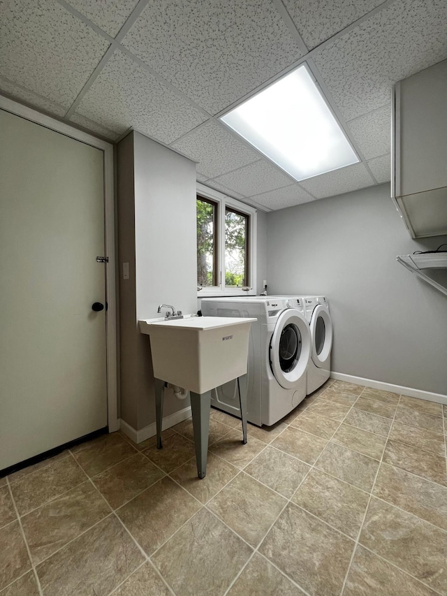 17300 Baseline Ave, Sand Creek Twp, MN 55352 - laundry room featuring washer and clothes dryer and baseboards
