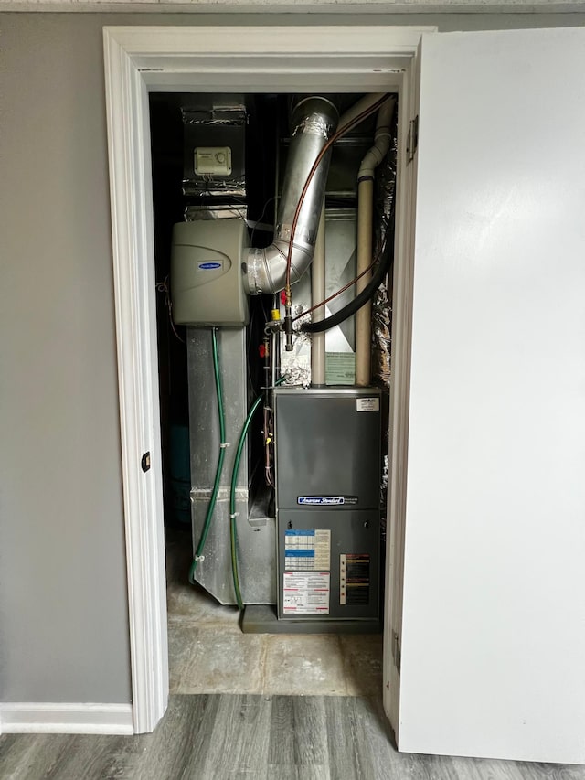 17300 Baseline Ave, Sand Creek Twp, MN 55352 - utility room with heating unit