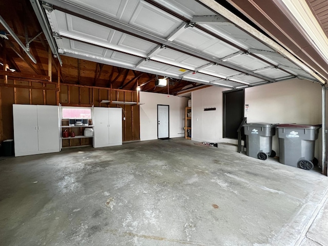 17300 Baseline Ave, Sand Creek Twp, MN 55352 - garage with a garage door opener