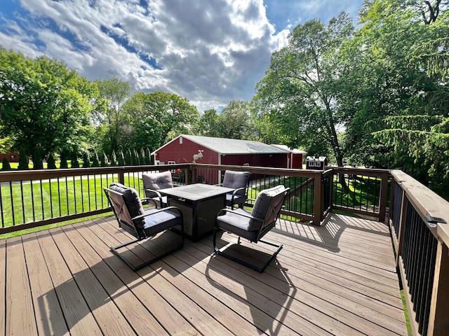 17300 Baseline Ave, Sand Creek Twp, MN 55352 - wooden terrace featuring outdoor dining space, view of wooded area, and a yard