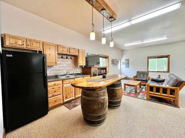 17300 Baseline Ave, Sand Creek Twp, MN 55352 - kitchen with freestanding refrigerator, tasteful backsplash, a sink, wood counters, and light brown cabinets