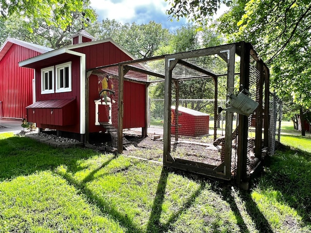 17300 Baseline Ave, Sand Creek Twp, MN 55352 - view of poultry coop with a lawn
