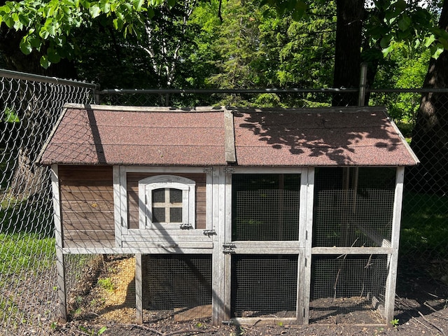 17300 Baseline Ave, Sand Creek Twp, MN 55352 - view of side of home featuring exterior structure and an outdoor structure
