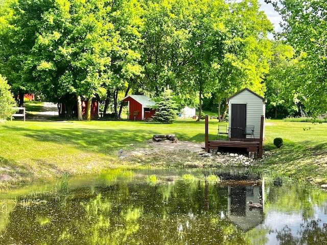 17300 Baseline Ave, Sand Creek Twp, MN 55352 - view of grassy yard featuring a water view