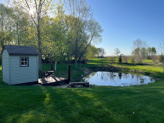 17300 Baseline Ave, Sand Creek Twp, MN 55352 - view of green lawn featuring a water view