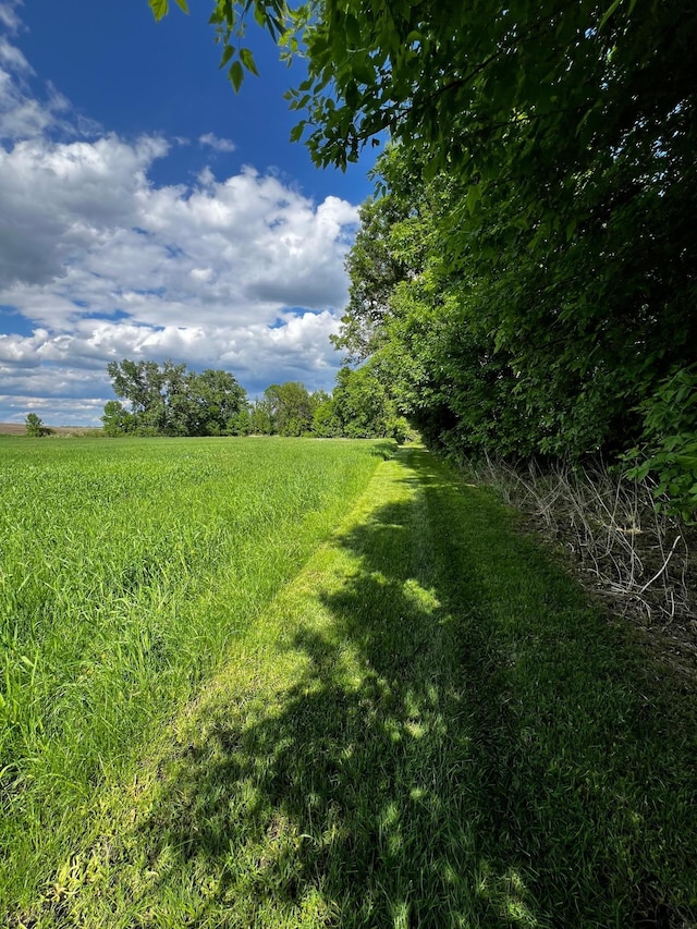 17300 Baseline Ave, Sand Creek Twp, MN 55352 - view of green lawn with a view of countryside