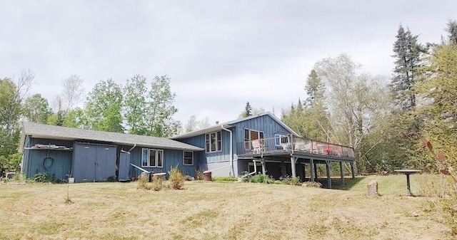 7470 Point Ln, Britt, MN 55710 - view of front of property with a front yard, a wooden deck, and board and batten siding