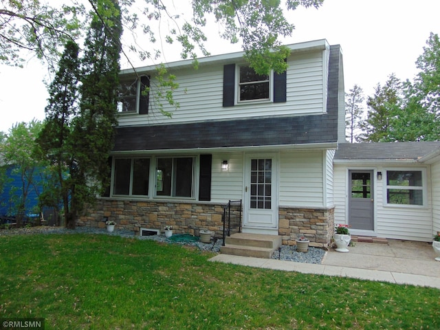 2531 Mayfair Ave, White Bear Lake, MN 55110 - view of front of house with a front lawn, stone siding, and roof with shingles