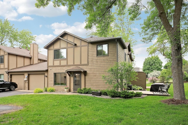 11594 Scotch Pine Ct, Eden Prairie, MN 55344 - view of front of home with driveway, an attached garage, a front lawn, and roof with shingles