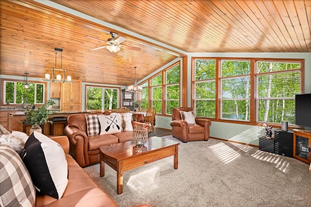 2614 Leroy Rd, Eveleth, MN 55734 - carpeted living area with a chandelier, vaulted ceiling, wood ceiling, ceiling fan, and baseboards