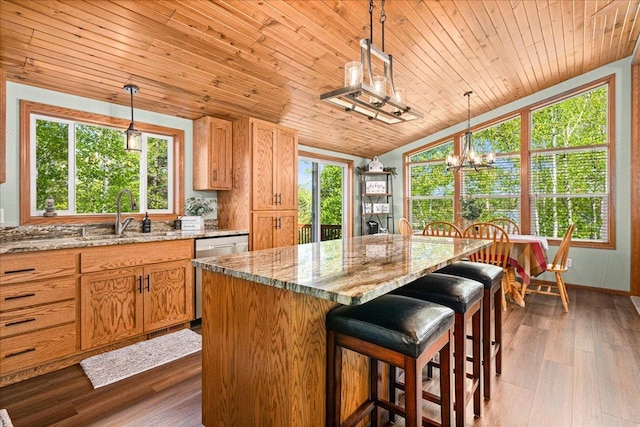 2614 Leroy Rd, Eveleth, MN 55734 - kitchen with a sink, a chandelier, vaulted ceiling, light stone countertops, and wooden ceiling