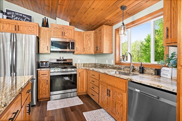 2614 Leroy Rd, Eveleth, MN 55734 - kitchen featuring appliances with stainless steel finishes, lofted ceiling, a sink, plenty of natural light, and dark wood-type flooring