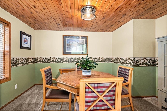 2614 Leroy Rd, Eveleth, MN 55734 - dining space with carpet flooring, wood ceiling, and baseboards