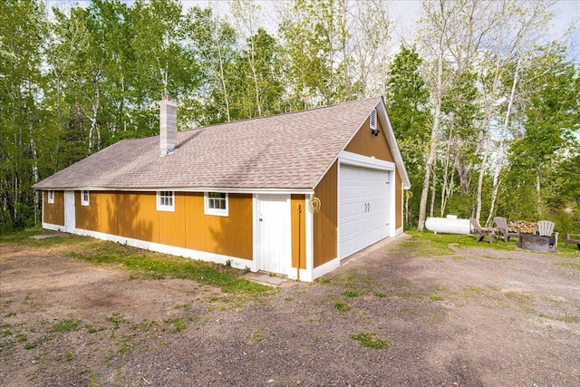 2614 Leroy Rd, Eveleth, MN 55734 - detached garage with view of scattered trees