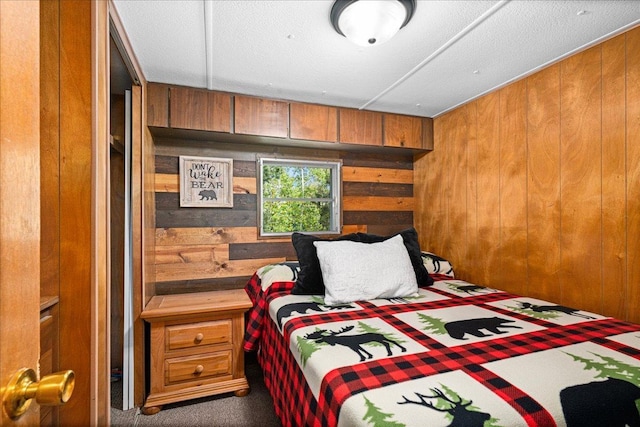 2614 Leroy Rd, Eveleth, MN 55734 - carpeted bedroom with wood walls