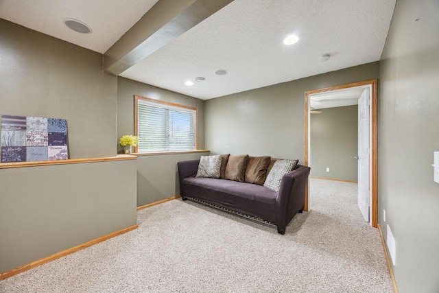 12332 3rd St NE, Blaine, MN 55434 - living room featuring carpet floors, a textured ceiling, baseboards, and recessed lighting