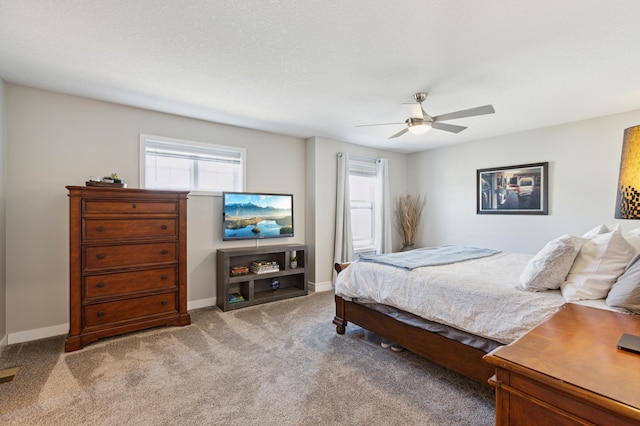 11564 Woodside Dr, Rogers, MN 55311 - carpeted bedroom featuring baseboards and a ceiling fan