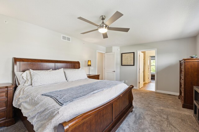 11564 Woodside Dr, Rogers, MN 55311 - bedroom featuring carpet, baseboards, and a ceiling fan