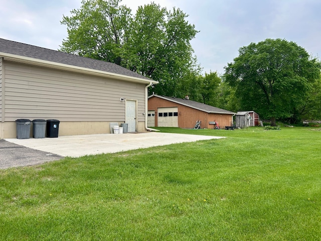 10696 Leaf River Rd, Leaf River Twp, MN 56482 - view of grassy yard featuring an outbuilding and a detached garage
