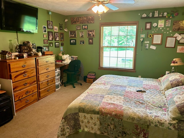 10696 Leaf River Rd, Leaf River Twp, MN 56482 - bedroom with light carpet, a desk, and ceiling fan