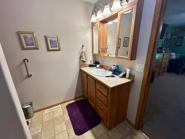 10696 Leaf River Rd, Leaf River Twp, MN 56482 - bathroom with baseboards and vanity