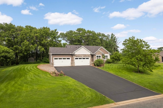 2349 175th Ln NE, Ham Lake, MN 55304 - ranch-style home with driveway, stone siding, an attached garage, and a front yard
